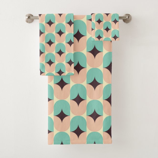 Geometric pattern of teal, beige, and black shapes (In situ)