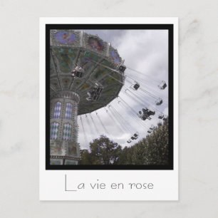 Giro de carrusel en París postal