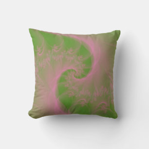 Giro rosa sobre las almohadas verdes