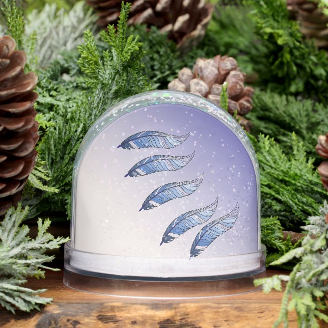 Globe de nieve - plumas azules flotando (Invierno)
