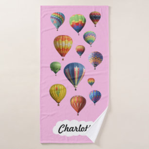 Globos de aire caliente en rosa claro
