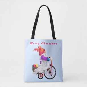 Gnome con los Navidades de bicicleta en la bolsa