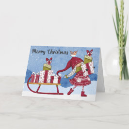 Gnome de vacaciones con tarjeta de Navidades prese