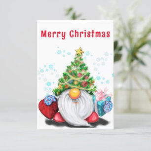 Gnome lindo con tarjeta de Navidades de regalo