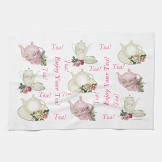 Goce de su toalla de té de la tetera del té