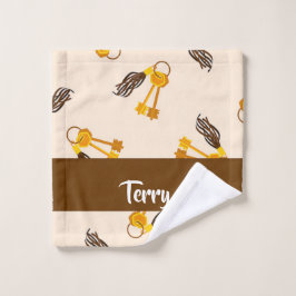 Gold house keys on pink