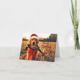 Golden Retriever con una tarjeta de vacaciones de 