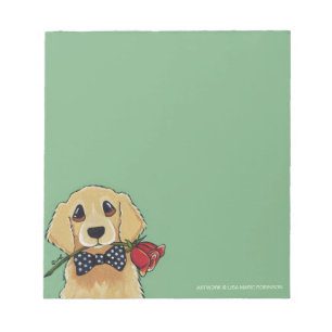 Golden retriever y pequeña libreta subió