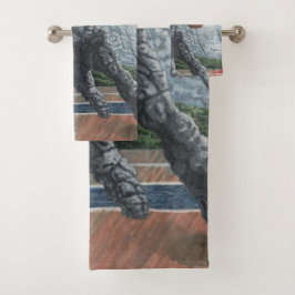 Golem de piedra que juega las toallas de baño del