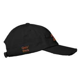 Gorra Bordada "Tan negros tan anaranjados" con " volver" y el