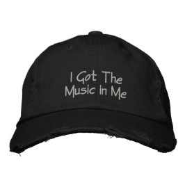 Gorra Bordada Tengo la música en mí...