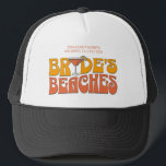 Gorra De Camionero Beach Bachelorette Party Groovy Bride's Beach<br><div class="desc">Disfrute de su próxima fiesta de soltera con esta impresionante fiesta de soltera de playa personalizada. Ya sea que esté celebrando un viaje en barca, unas vacaciones en chica o unas vacaciones con los mejores amigos, esta mercadería de una fiesta de soltera en la playa personalizado es el lugar perfecto...</div>
