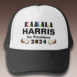 Gorra De Camionero Kamala Coconut Trucker Hat<br><div class="desc">Levántate y habla con este camionero que apoya la campaña de Kamala Harris por la presidencia. Cuenta con letras estilizadas y coloridas y con acentos gráficos de coco. Su elección de estilos de color</div>