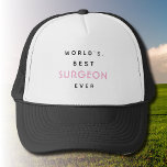 Gorra De Camionero Texto gracioso | El mejor cirujano del mundo | Reg<br><div class="desc">Texto gracioso e ilegal | Blanco y rosa | El mejor cirujano del mundo | Regalo para un cirujano. Usar esta camisa podría ser una manera divertida de mostrar orgullo por la profesión o de celebrar un logro personal. También podría servir como un comienzo de conversación y una manera de...</div>