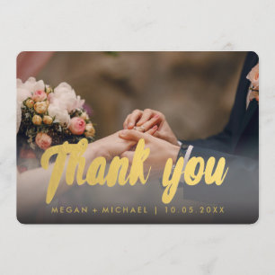 Gracias escritura del oro de la tarjeta de la foto