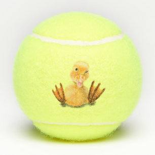 Graciosas bolas de tenis con feliz pato amarillo -