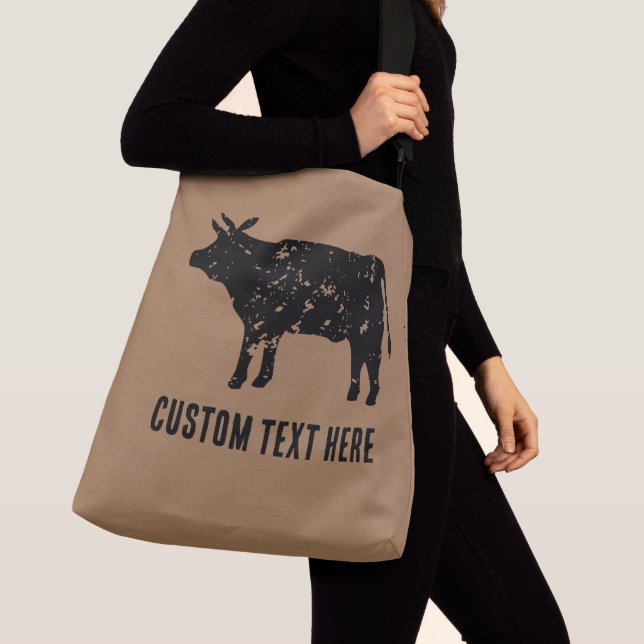 Gran bolso de cuerpo cruzado con silueta de vaca n (Detalle)