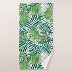 Gran palma verde de hierro y plantas tropicales mo