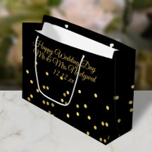 Bolsa de regalo de confeti negro y dorado para el