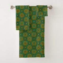 Green and gold patterned towels