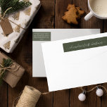 Green Babys First Christmas Return Address<br><div class="desc">Un simple y moderno ajuste navideño alrededor de la etiqueta de la dirección de retorno que presenta las primeras navidades en tipografía de escritura blanca sobre un fondo verde oscuro. Personaliza con tu nombre de bebé. Añada este detalle especial a sus envíos de correo de vacaciones.</div>