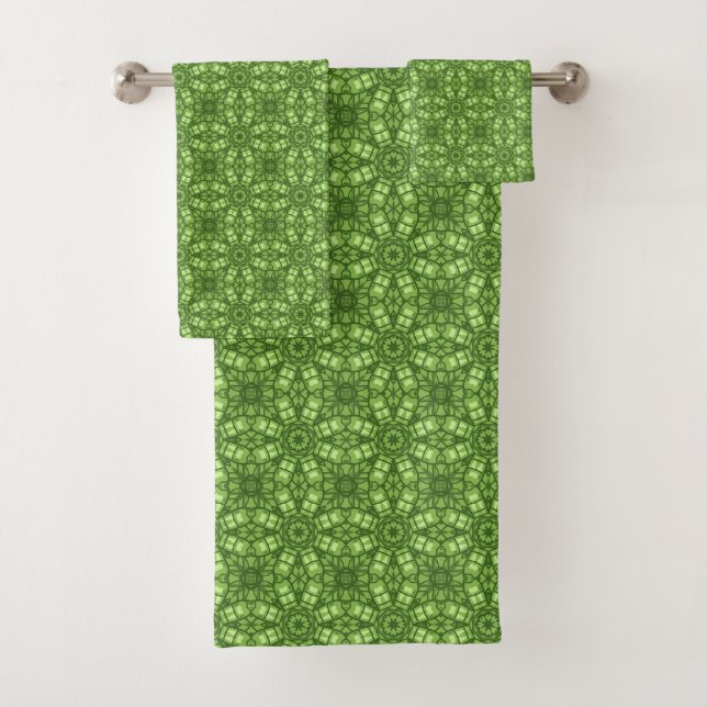 Green towels with a white floral pattern (In situ)