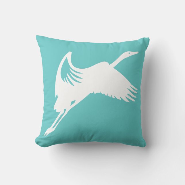 grulla blanca sobre almohada azul turquesa (Anverso)