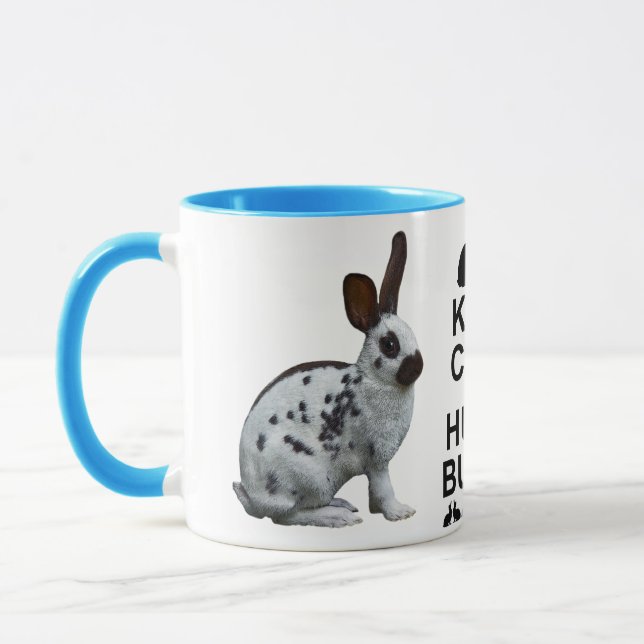 Guarde la calma y abrace una taza del conejito (Izquierda)