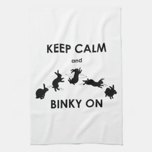 Guarde la calma y Binky en la toalla de cocina