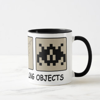 Guárdese de la taza del vidrio de objetos que cae
