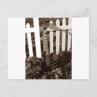 Guitarra eléctrica con perillas de cráneo postal B