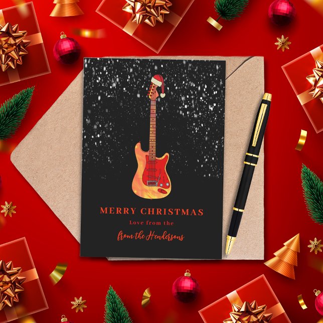Guitarra Fría Feliz Navidad Nieve Personalizada (Cool guitar wearing a Santa hat merry Christmas red and black personalized holidays card)