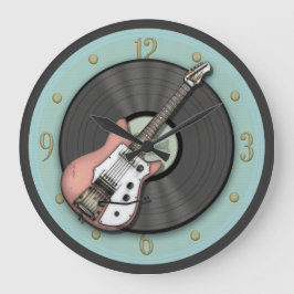 Guitarra rosa vintage y reloj de pared de grabació