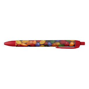Habas de jalea que escriben la pluma