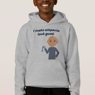 "Hago que la alopecia parezca buena" con un niño