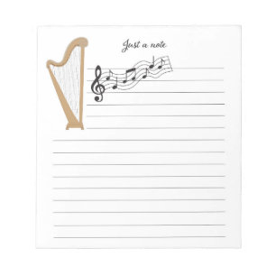 Harp de madera con bloc de notas de notas de músic