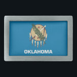 Hebilla de cinturón con bandera del estado de Okla<br><div class="desc">Añada un toque vibrante de espíritu de Oklahoma a su atuendo con nuestra exclusiva hebilla de cinturón con la bandera de Oklahoma! Diseñada con meticulosa atención a los detalles, esta hebilla de cinturón es más que funcional; es una celebración del legado de Oklahoma y el orgullo del estado. El audaz...</div>