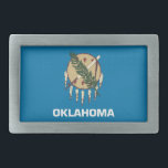 Hebilla de cinturón con bandera del estado de Okla<br><div class="desc">Añada un toque vibrante de espíritu de Oklahoma a su atuendo con nuestra exclusiva hebilla de cinturón con la bandera de Oklahoma! Diseñada con meticulosa atención a los detalles, esta hebilla de cinturón es más que funcional; es una celebración del legado de Oklahoma y el orgullo del estado. El audaz...</div>
