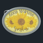 Hebilla De Cinturón Oval Buenos días Sunshine Sunflower<br><div class="desc">Foto de primer plano de un girasol amarillo brillante con el texto "Good Morning Sunshine" en color marrón muy oscuro sobre fondo amarillo claro. El texto se puede editar,  por lo que si lo desea,  puede reemplazar la palabra Sunshine por un nombre u otro texto,  por ejemplo.</div>