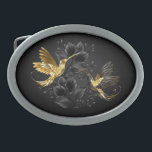 Hebilla De Cinturón Oval Colibrí negro y dorado<br><div class="desc">Colibríes con joyas negras y doradas sobre un fondo gris adornado con plantas. Aves de joyas. Ave dorada. Ave dorada.</div>
