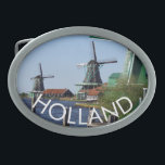Hebilla De Cinturón Oval Foto tradicional de molinos de viento de los blanc<br><div class="desc">Durante sus vacaciones en Holanda, visite los famosos molinos de madera del museo al aire libre Zaanse Schans. Estos son molinos originales de viento de la Edad de Oro de Holanda. La región de Zaan deriva su nombre del río Zaan, un amplio y flojo río húmedo a lo largo del...</div>