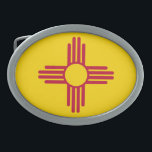 HEBILLA DE CINTURÓN OVAL NUEVA BANDERA ESTATAL DE MÉXICO<br><div class="desc">La bandera del estado de Nuevo México consiste en un símbolo rojo del sol del pueblo zia en un campo de oro (amarillo).</div>