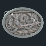 HEBILLA DE CINTURÓN OVAL RUEDAS DE TREN DE VAPOR<br><div class="desc">Diseño artístico de las ruedas de un tren de vapor.</div>