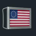 Hebilla De Cinturón Rectangular El círculo de las estrellas, la bandera estadounid<br><div class="desc">El Círculo de las Estrellas: El año era 1776, y las colonias estaban a punto de declarar su independencia de Gran Bretaña. Se formó un comité para diseñar una bandera que representaría a la nueva nación, y buscaron la ayuda de una costurera calificada llamada Betsy Ross. - Ross era conocida...</div>