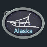 Hebilla Ovalada Perro<br><div class="desc">Una silueta blanca de un perro colgado en un fondo de estrellas. El texto que dice "Alaska" aparece en azul brillante y blanco.</div>