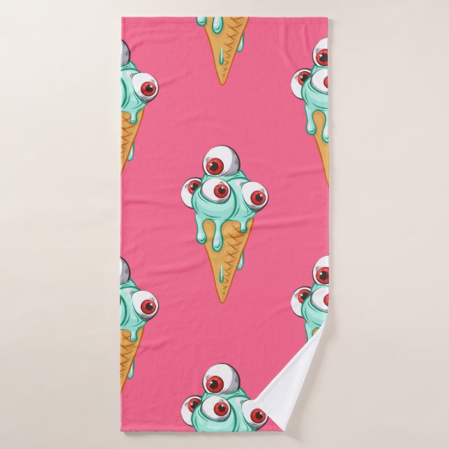 Helado azul con ojos. Fondo rosa. Marismas (Toalla de baño)