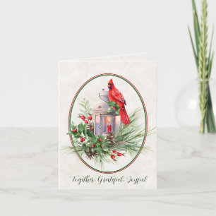 Hermosa linterna con acebo y Navidad cardenal