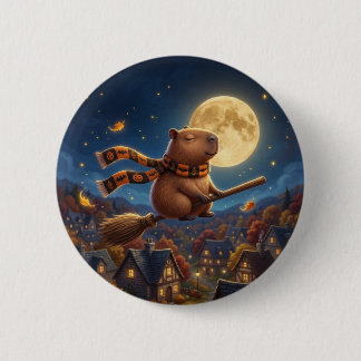 Hermoso botón de pin con capibara volando en escob