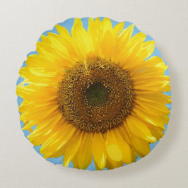 Hermoso girasol en cojín redondo de color azul tur