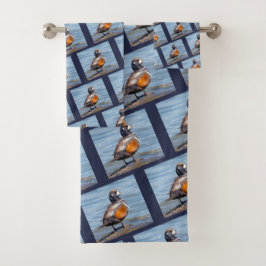 Hermoso pato Harlequin en la roca